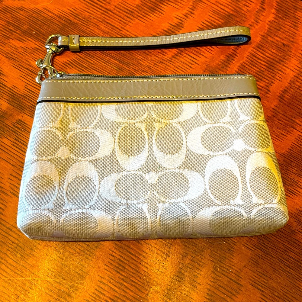 Coach gray and white wristlet